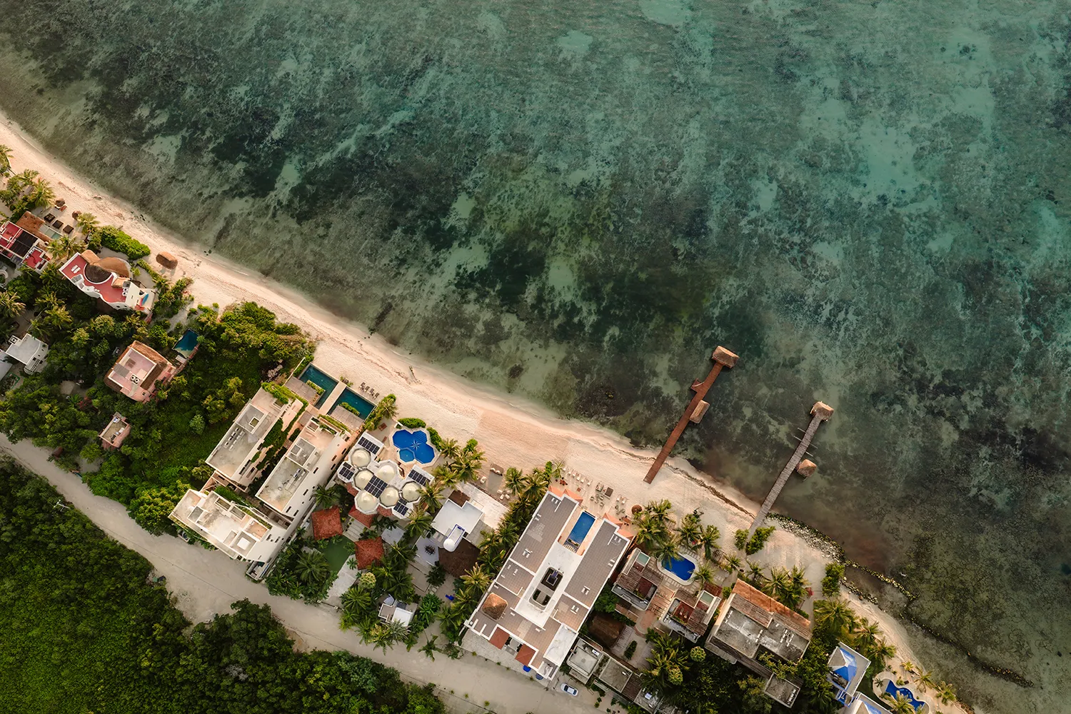 Beach loungers at Tankah Bay, Tulum