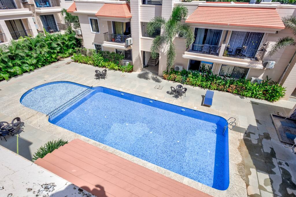 2BHK | Zero Airbnb Fees | Tidal Twist | Pool photo 3