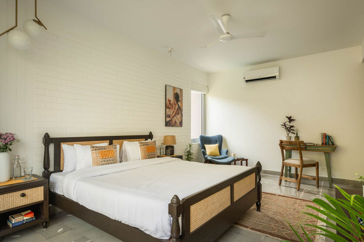 Beautiful Bedroom with swimming pool view from window and a private balcony