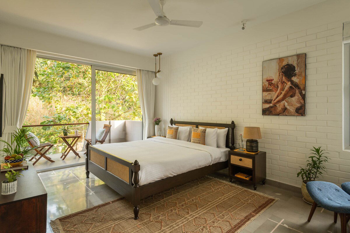 Beautiful Bedroom with swimming pool view from window and a private balcony